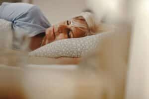 mature woman lying on her side enjoying the benefits of a short nap
