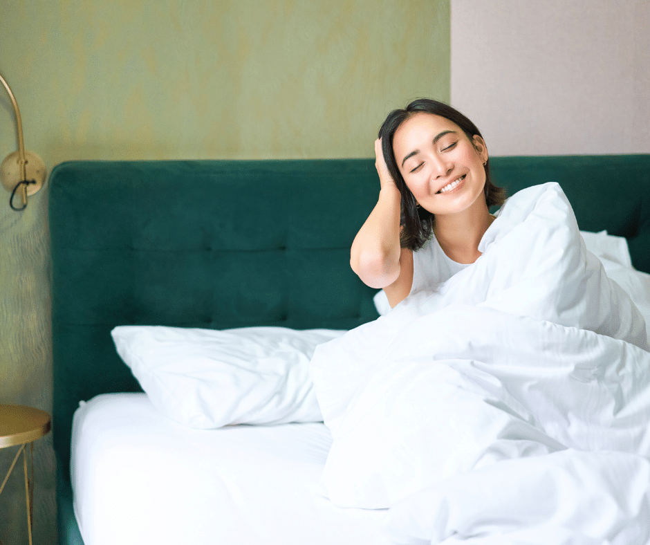 better breathing techniques for sleep_ guide cover model_young woman waking up happy in bed