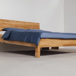 solid oak inclined bed frame for samina sleep system with blue bedding